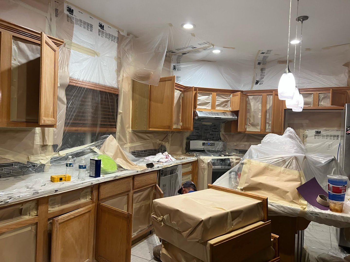 Kitchen cabinet painting in progress