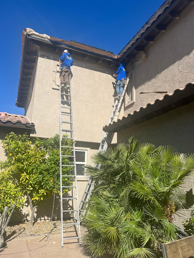 Lara Painting crew painting a stucco exterior